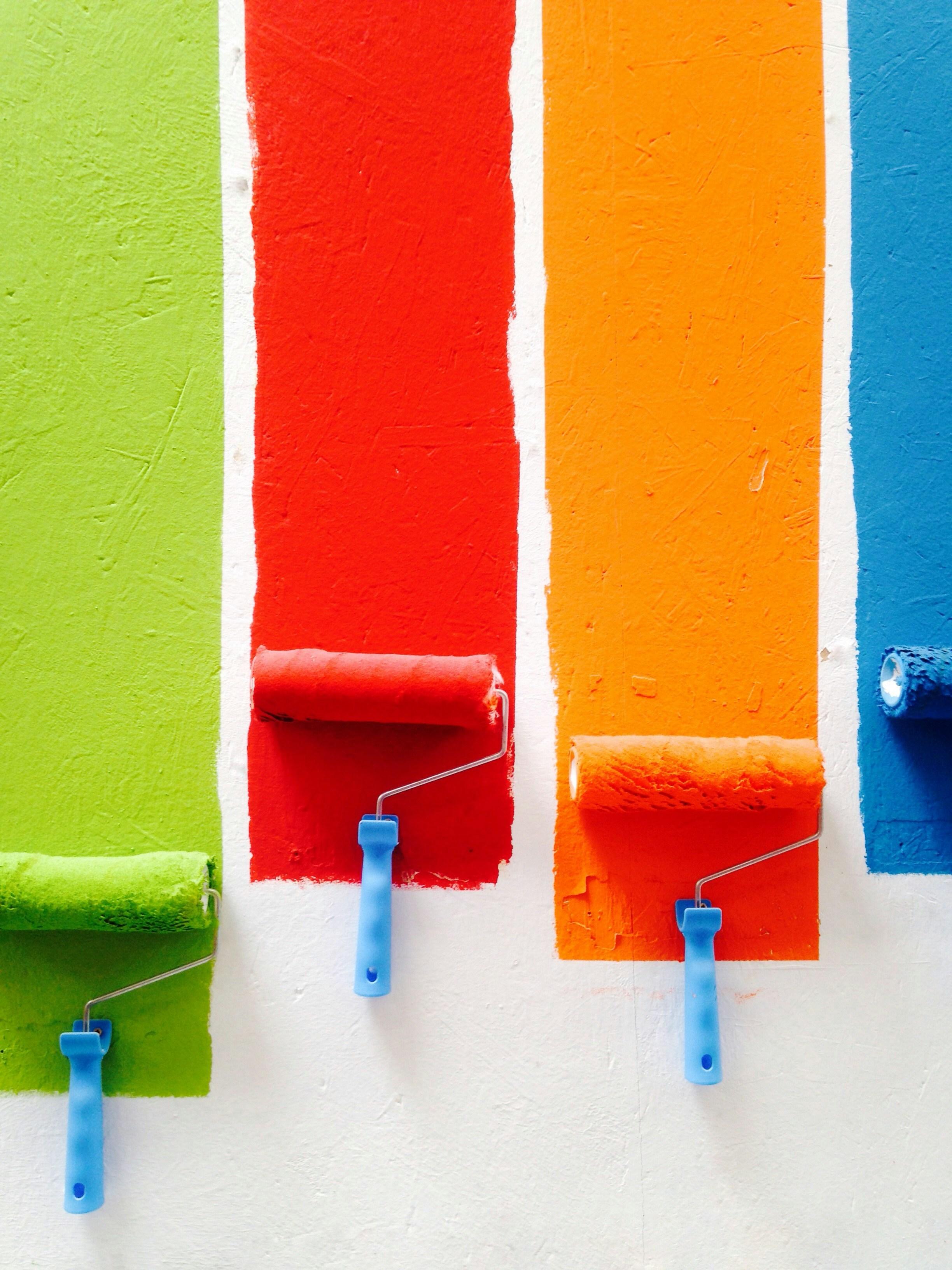 Professional painter applying premium wall finish